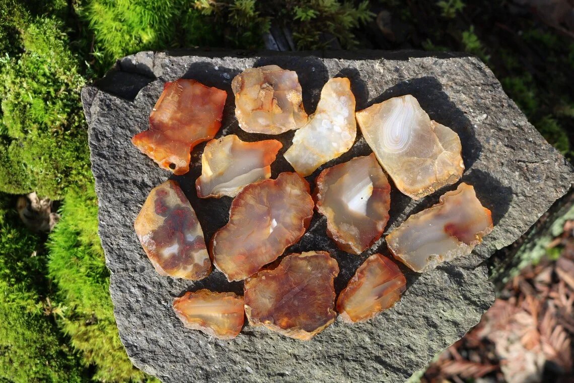 Collection of raw carnelian agates on stone
